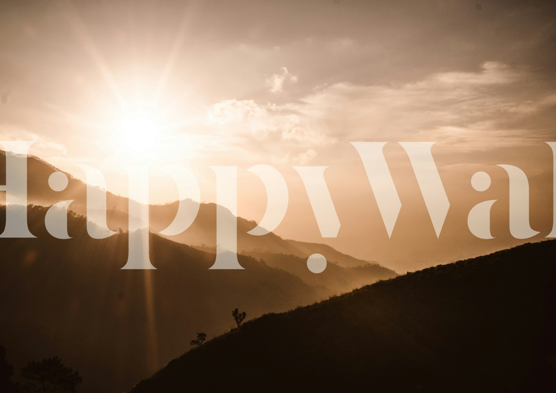 Sunrise over a peaceful valley wall mural