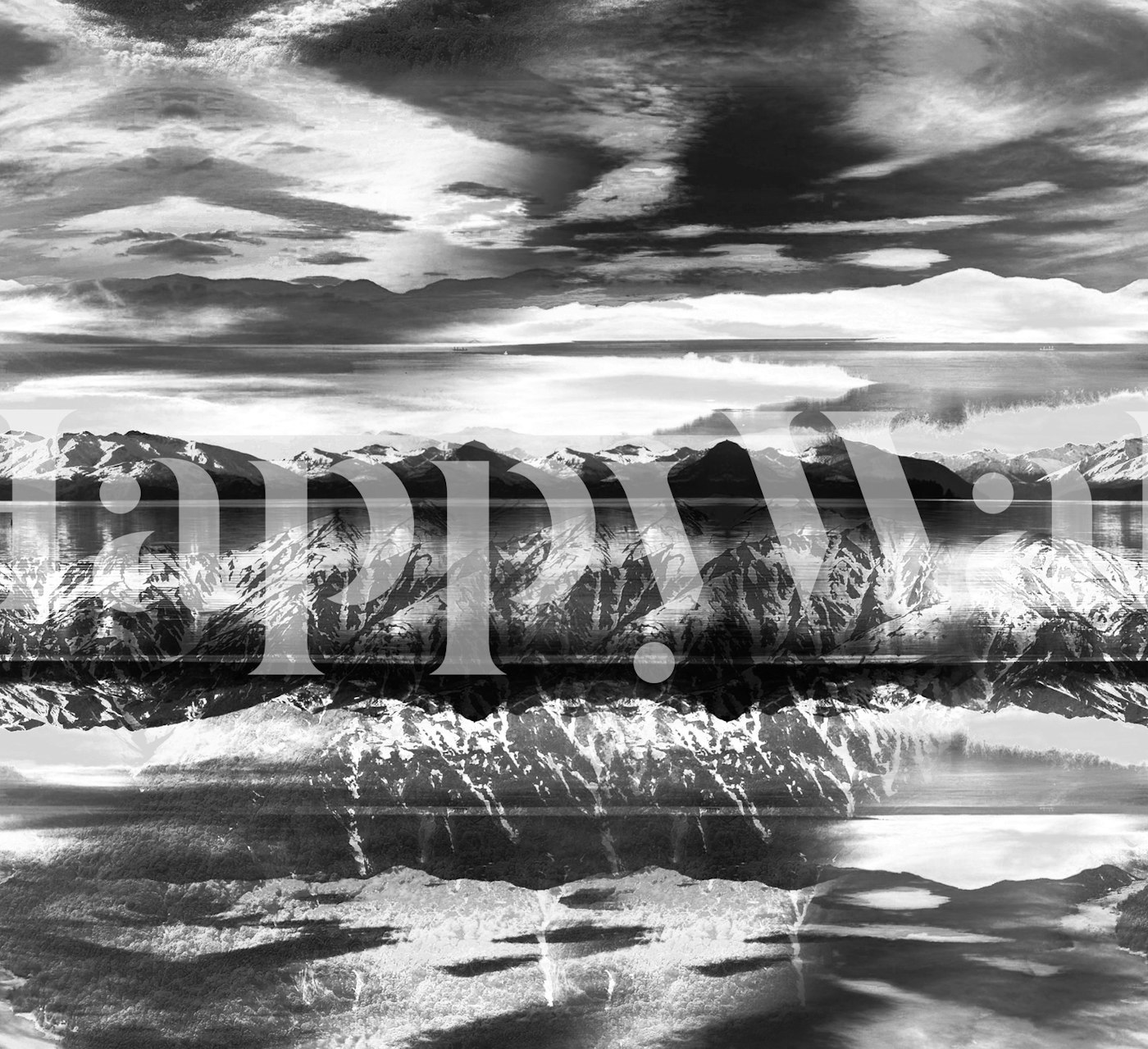 Monochrome misty mountains wallpaper in a room