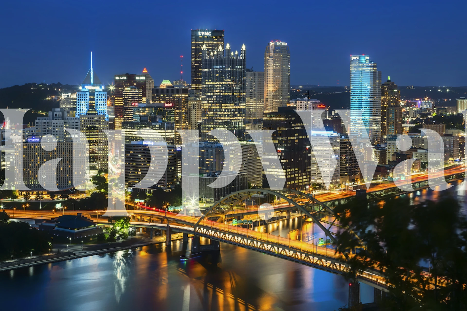 Pittsburgh city skyline at night with illuminated buildings and bridges wallpaper
