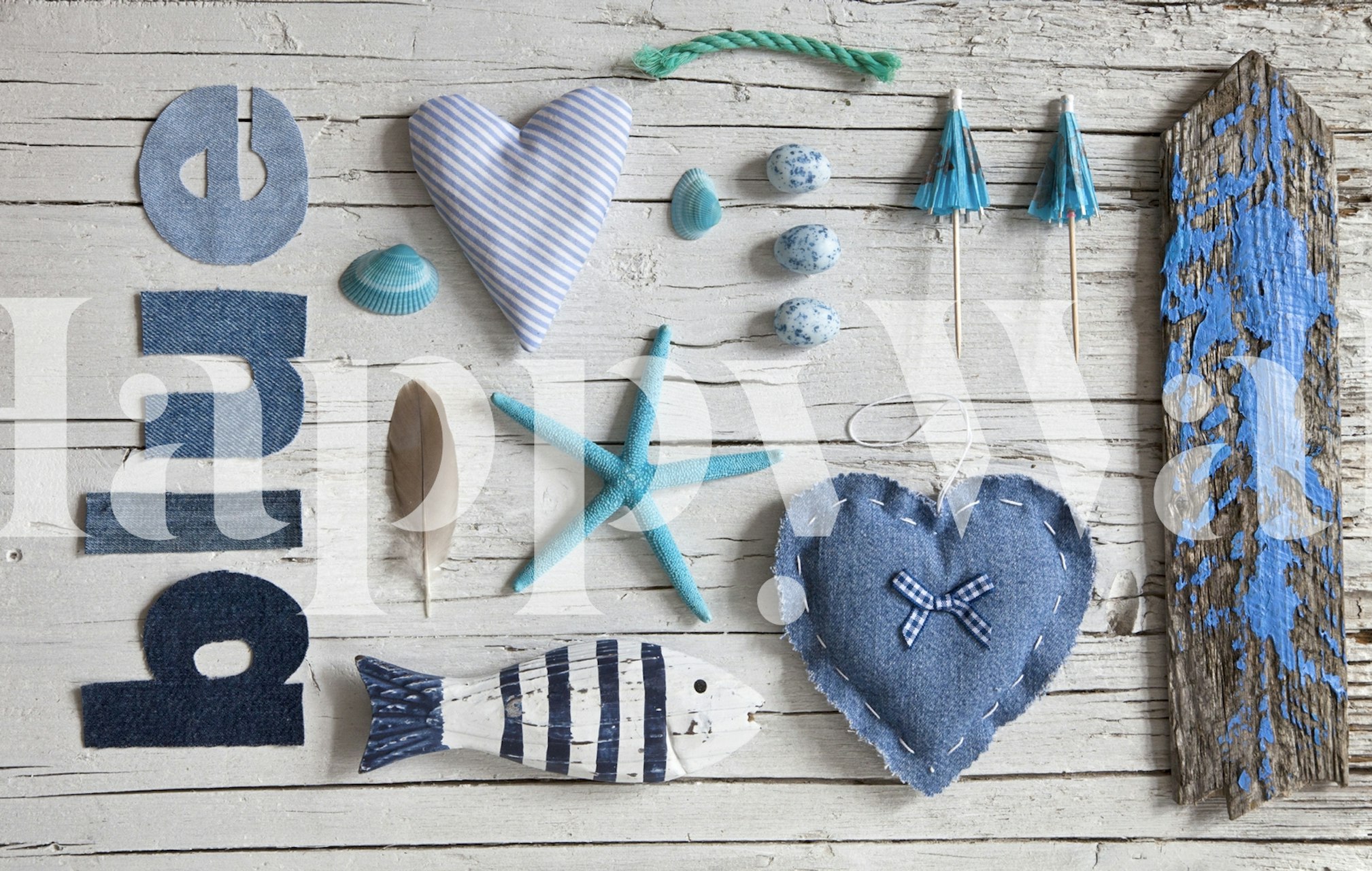 Nautical themed blue and white elements, including a fish, starfish, and hearts wallpaper