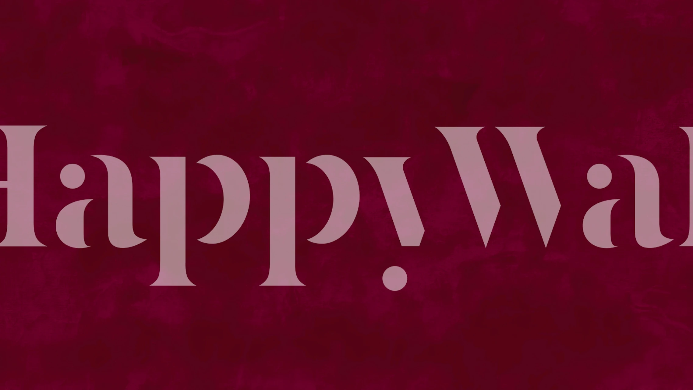 Dark cherry suede texture wallpaper in deep red tones.