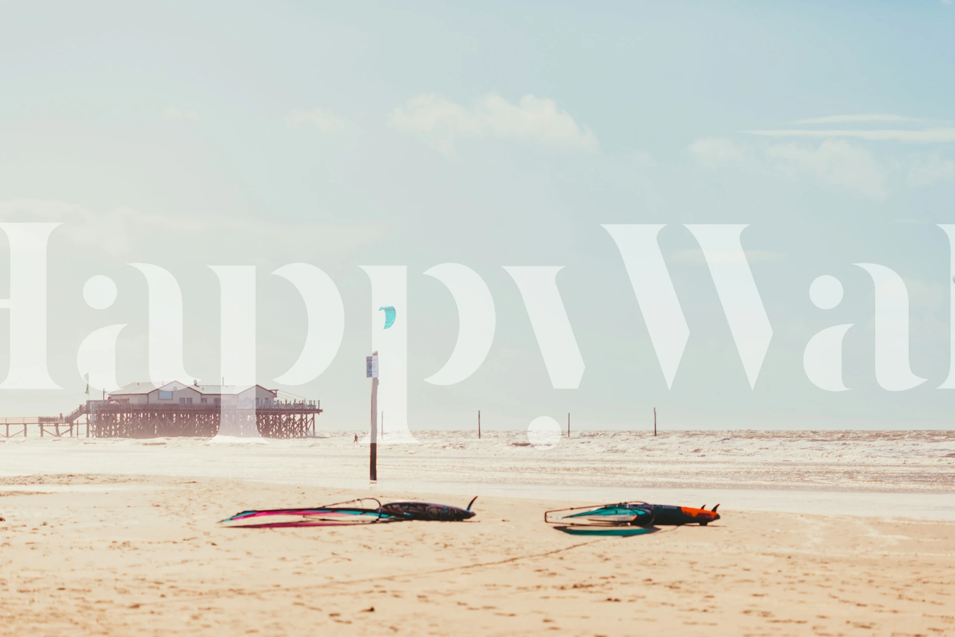 Beach scene with surfers and colorful surfboards wallpaper