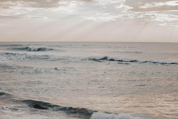 Peaceful Ocean Morning with Sailboat