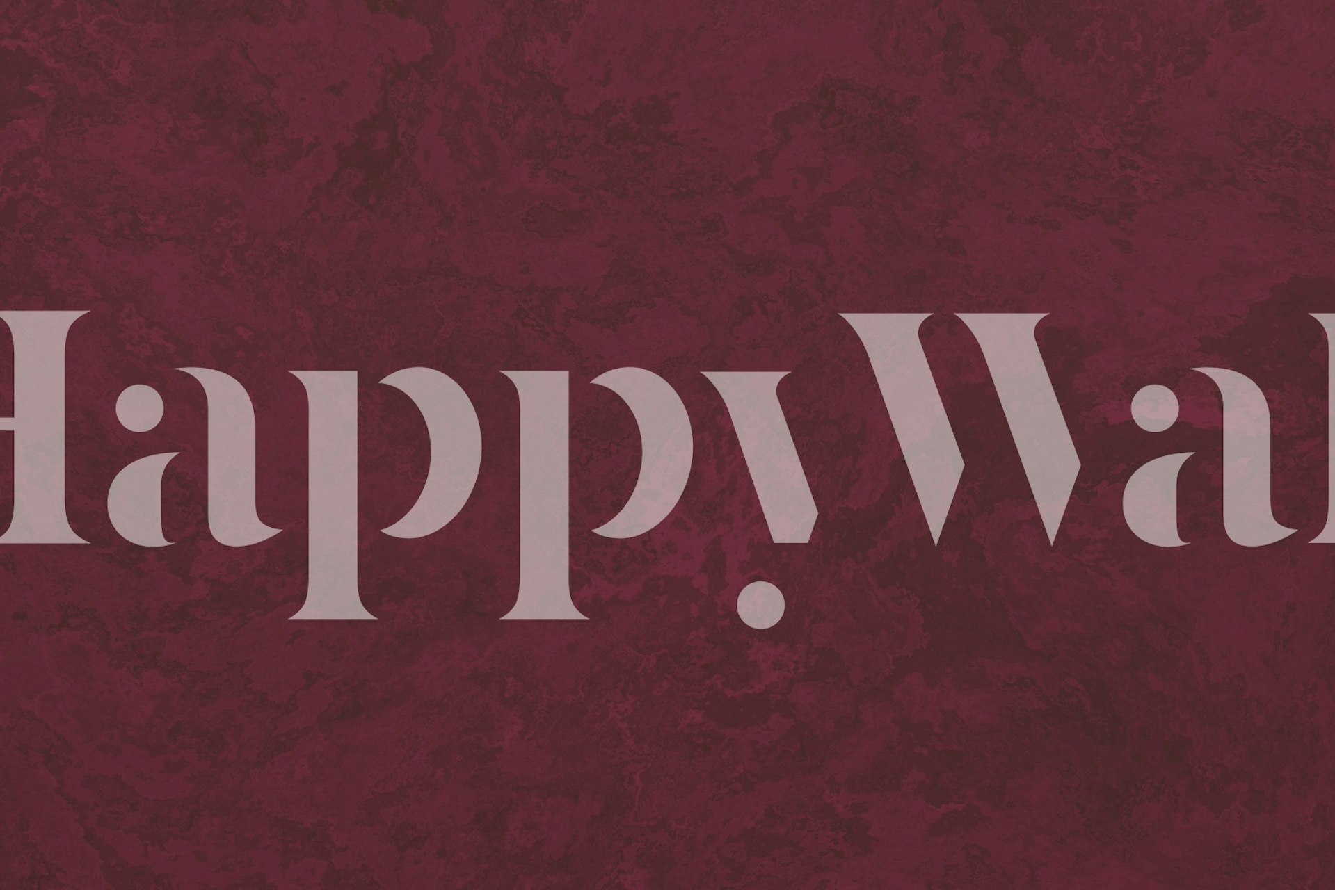 Garnet red concrete texture wallpaper with a matte finish and rich color variation