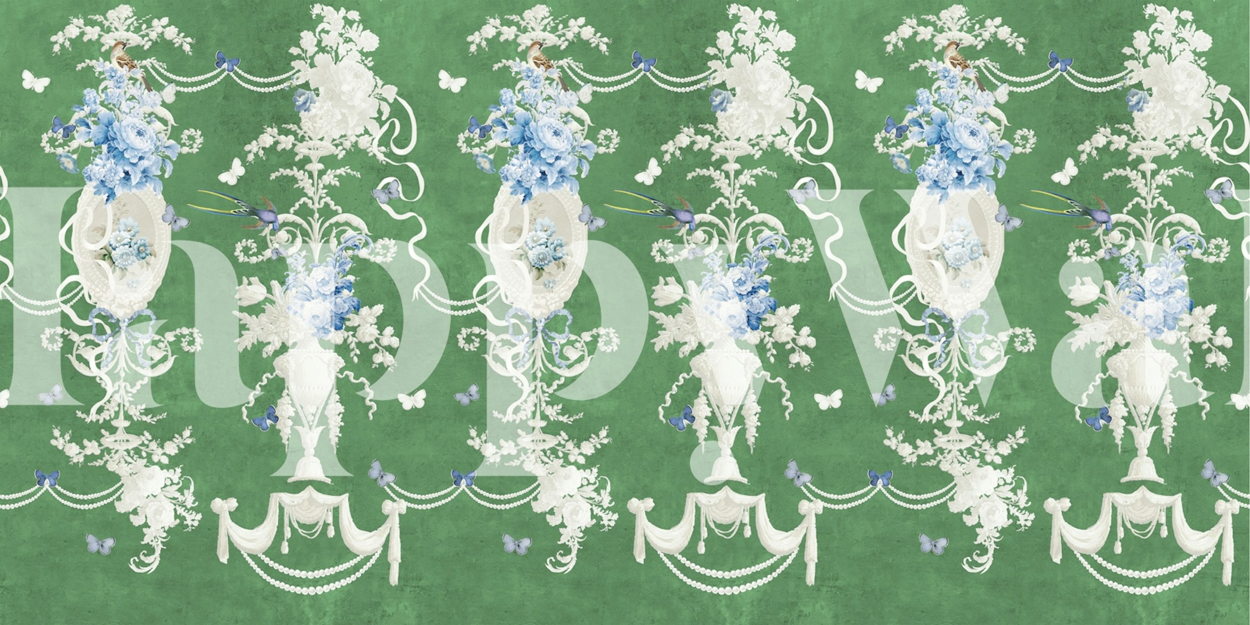 Floral arrangements in white and blue on green wallpaper