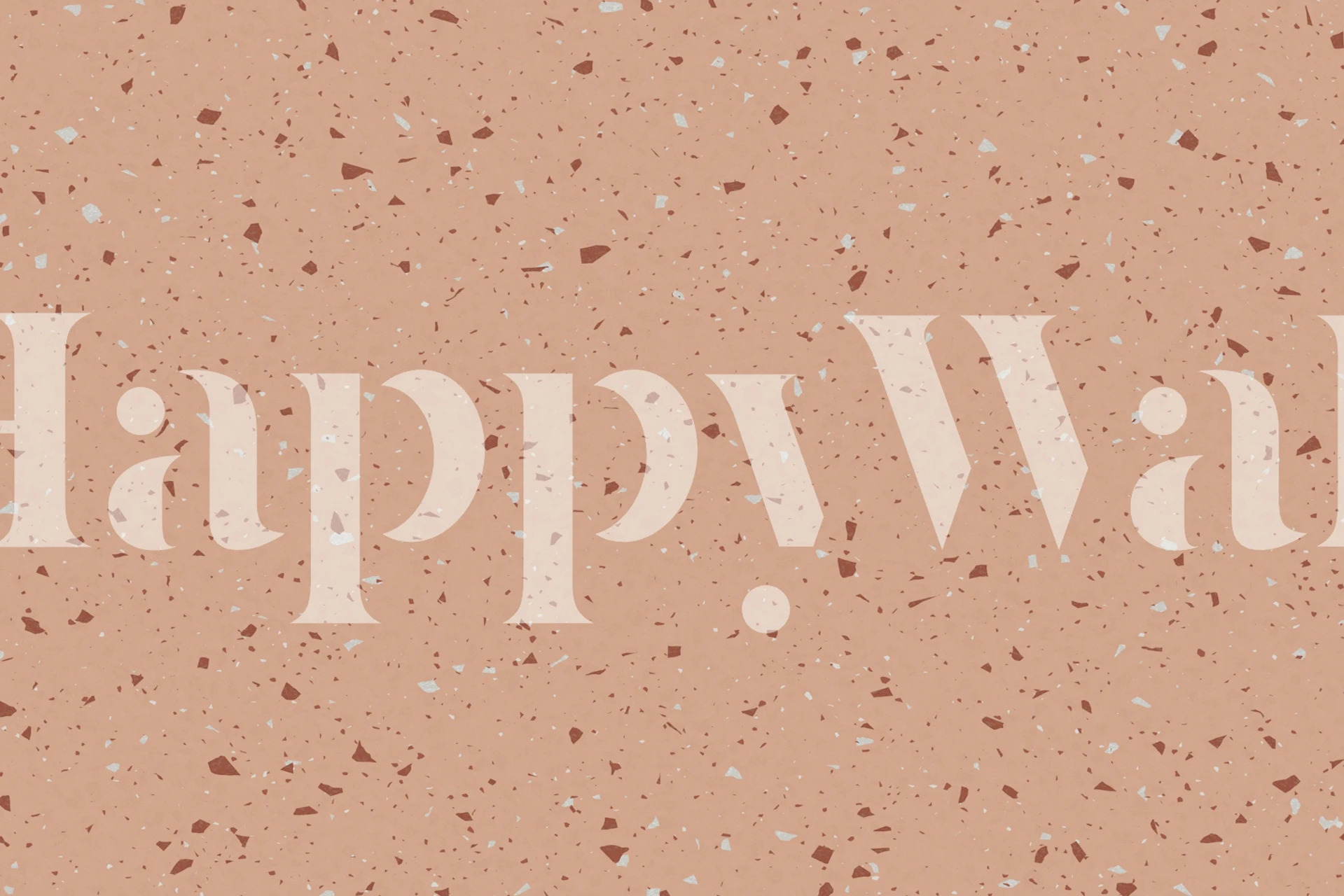 Peach terrazzo pattern wallpaper with white and brown speckles