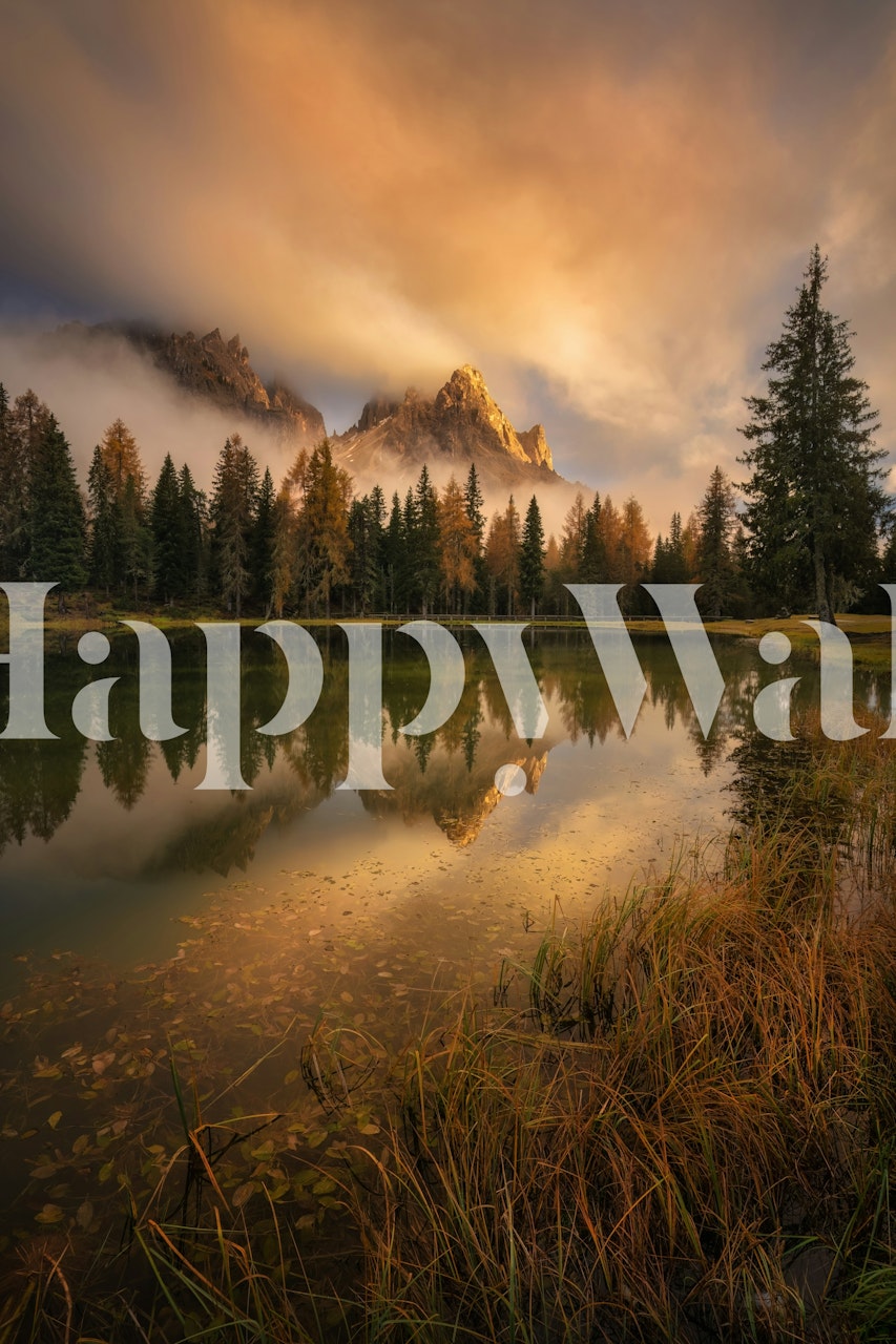 Mountain reflections in a lake surrounded by trees wallpaper