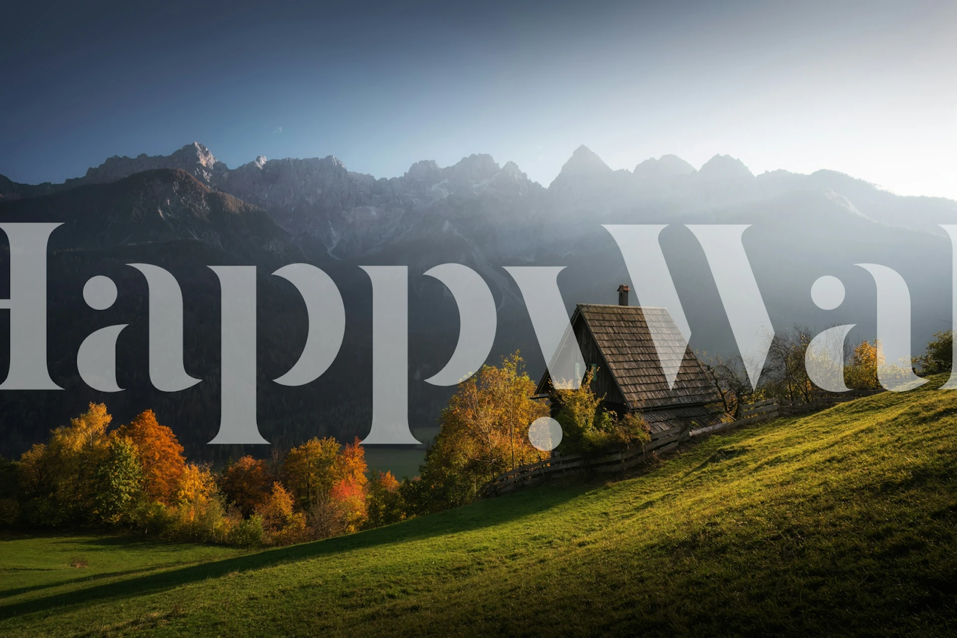 Rustic cabin in Slovenia with mountains and autumn foliage