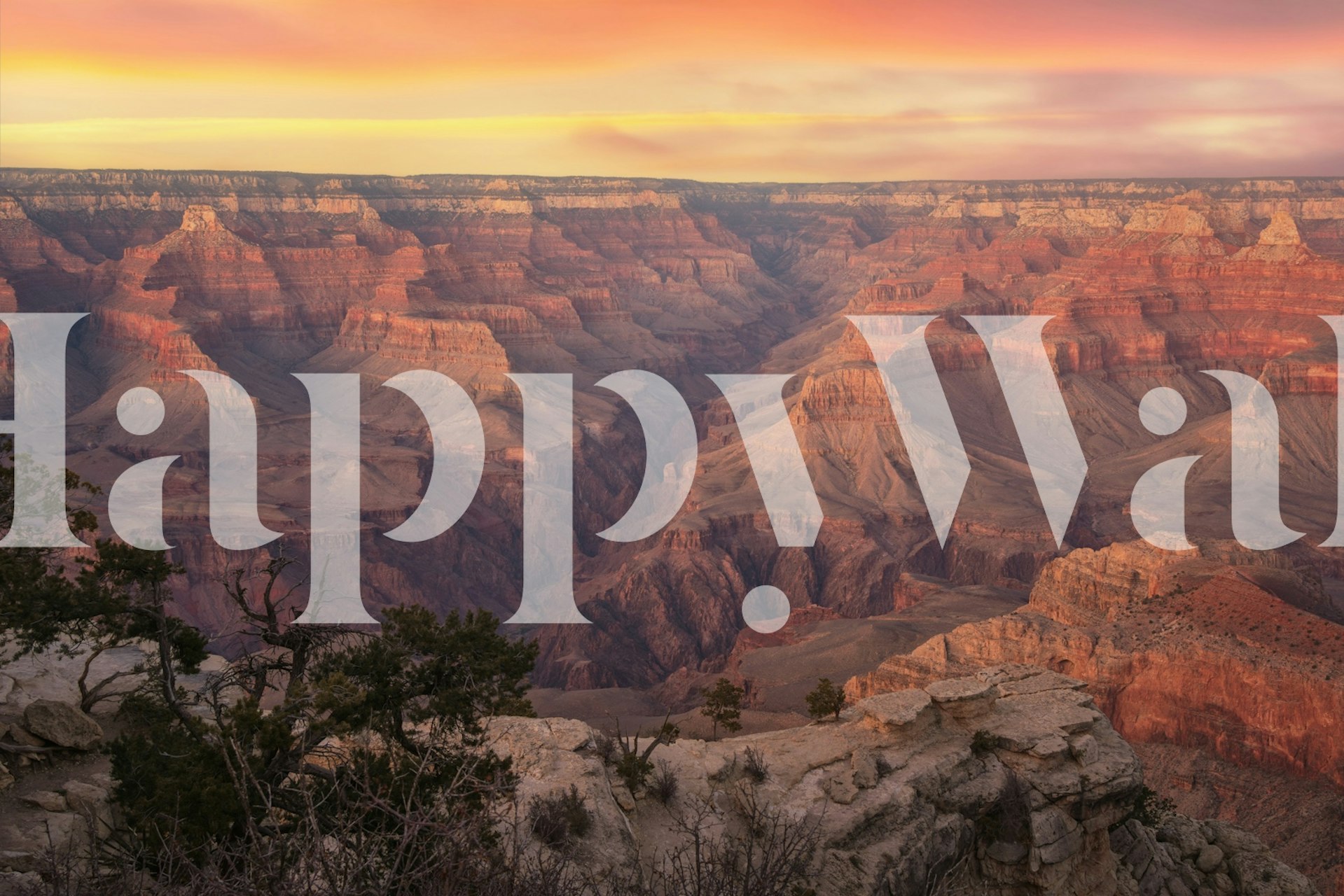 Grand Canyon landscape at sunset with orange and purple hues wallpaper