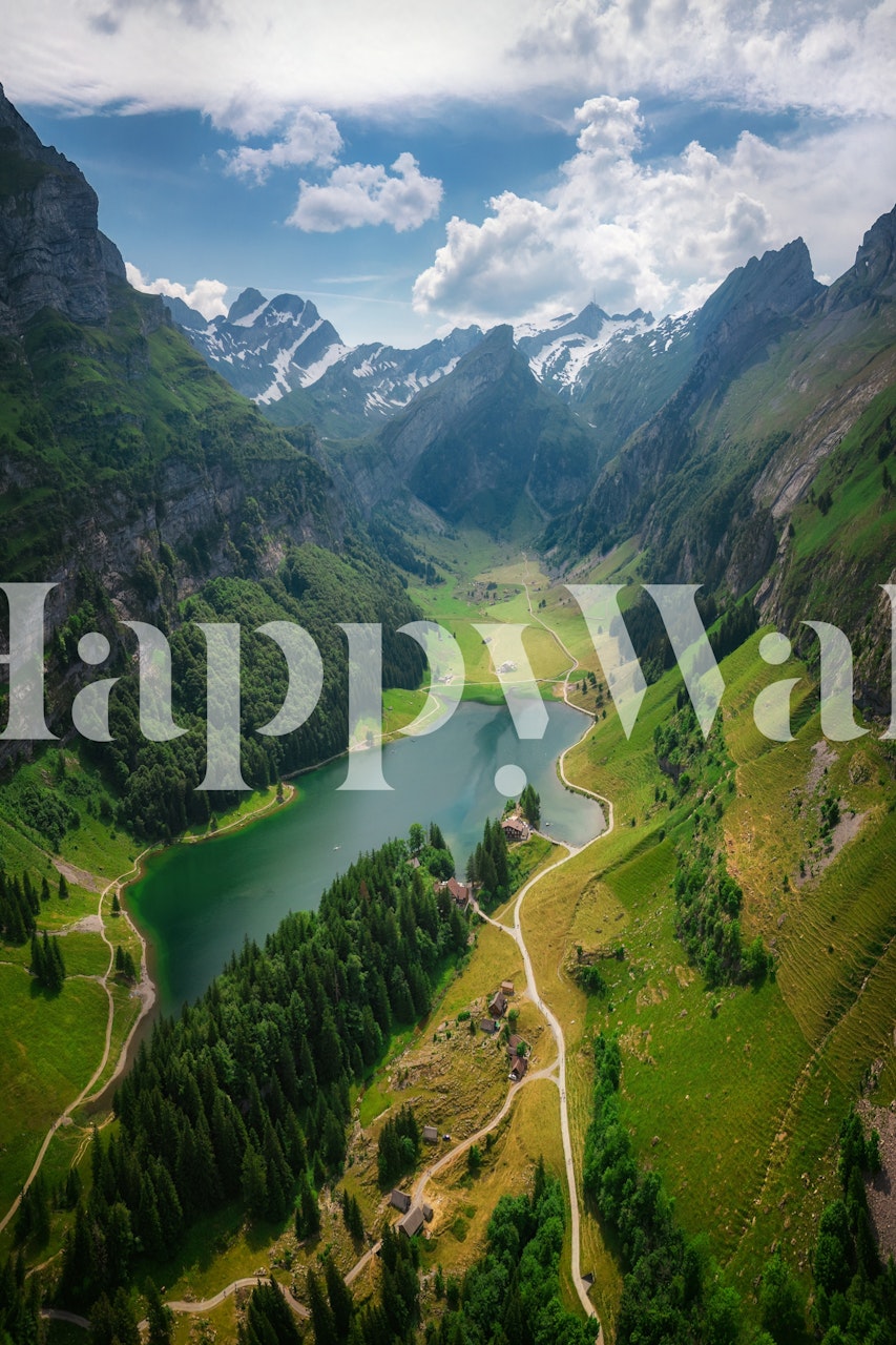 Mountain landscape with lush green hills and a lake wallpaper