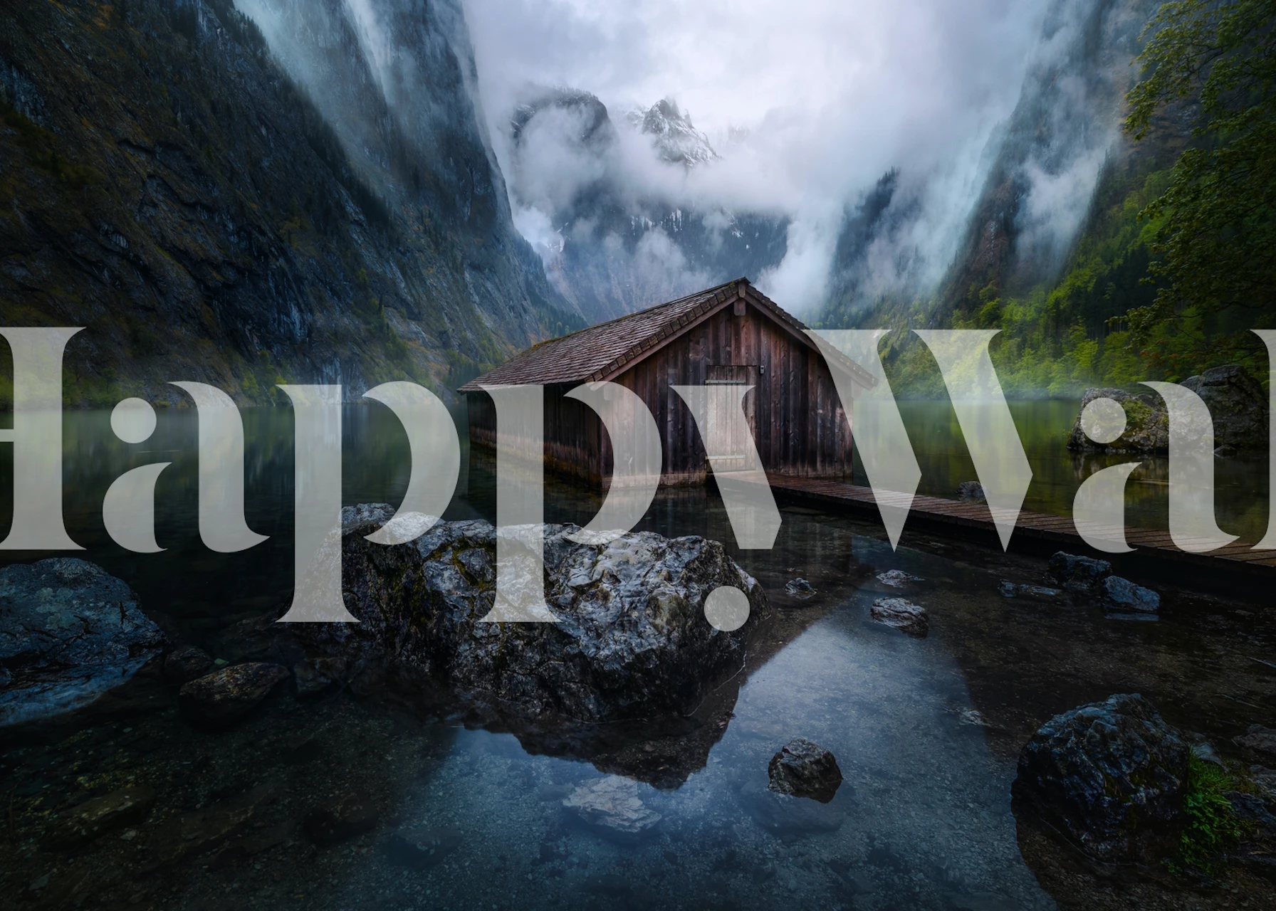 Rustic cabin on a mountain lake surrounded by cliffs wallpaper