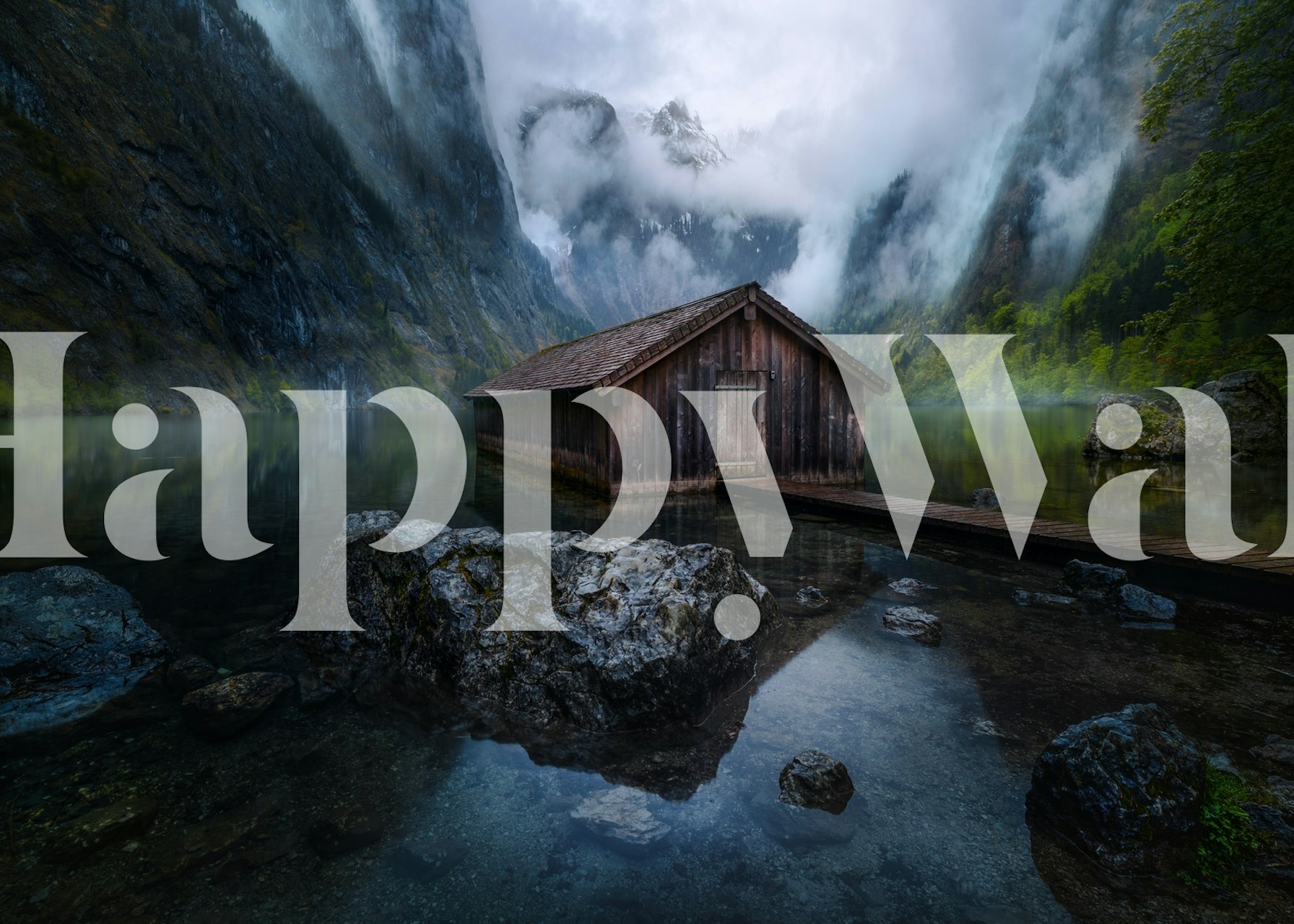 Rustic cabin on a mountain lake surrounded by cliffs wallpaper