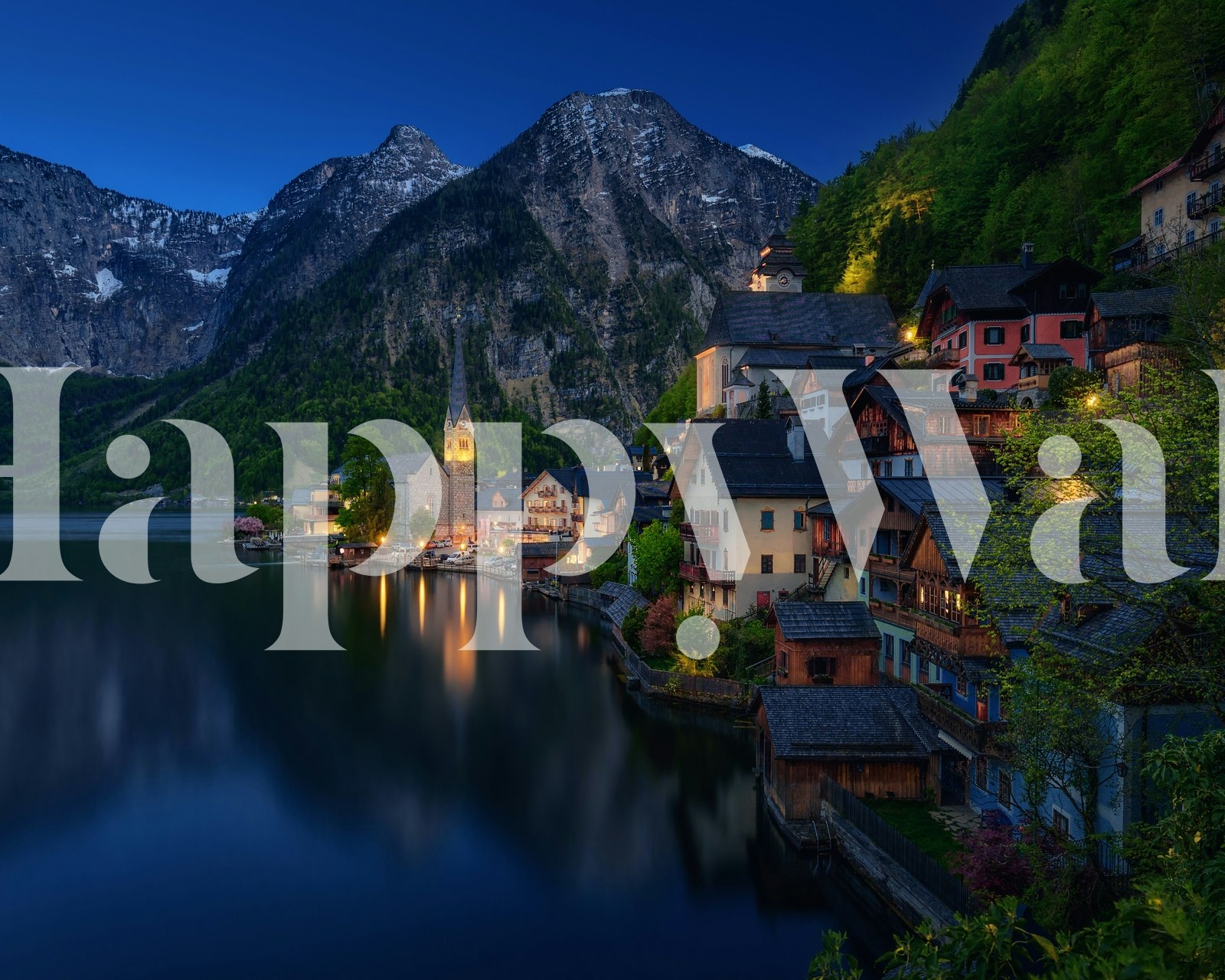 Scenic mountain lake view with buildings and trees wallpaper