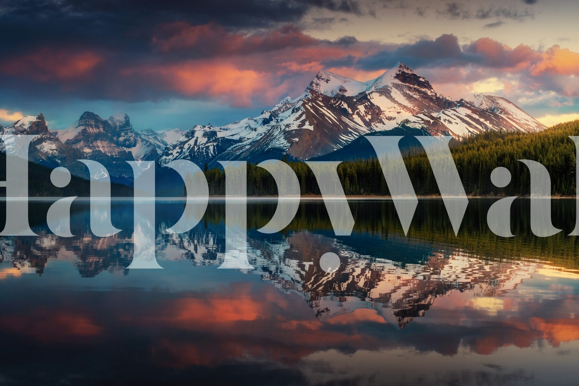 Majestic mountain range with colorful sunset reflection in a serene lake wall mural