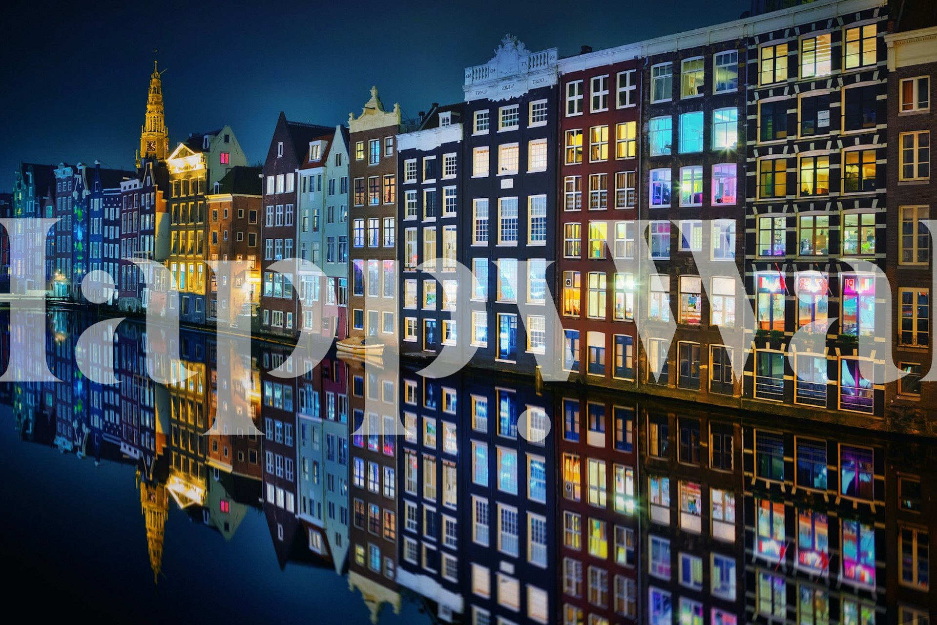 Colorful buildings along Amsterdam canal at night wallpaper