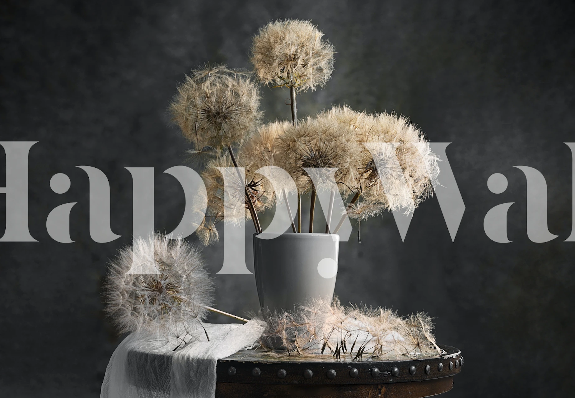 Dandelion seed pods in a vase on a wooden table, soft colors, floral wallpaper