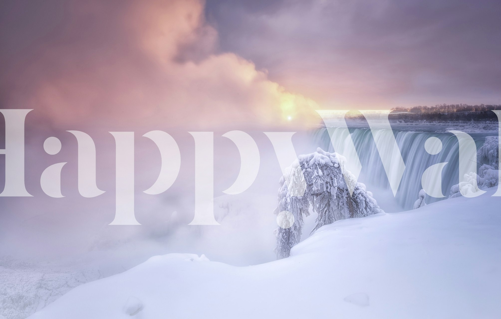 Misty sunrise at Niagara Falls with icy blue tones wallpaper