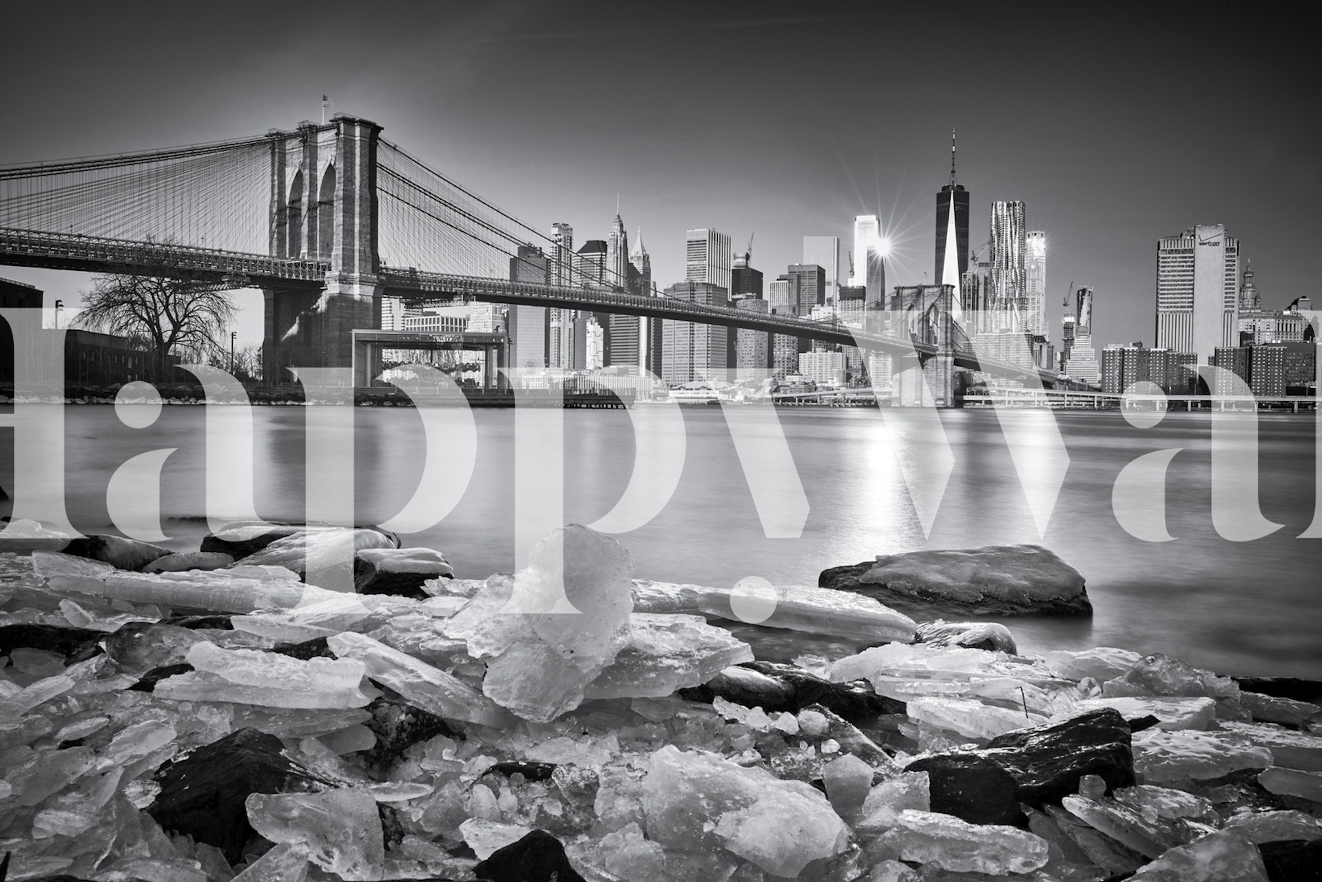 Black and white Brooklyn Bridge overlooking icy water wallpaper
