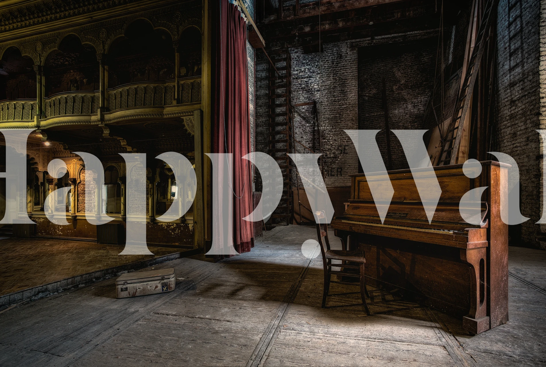 Vintage theater interior with wood piano, red curtains, and aged walls wallpaper