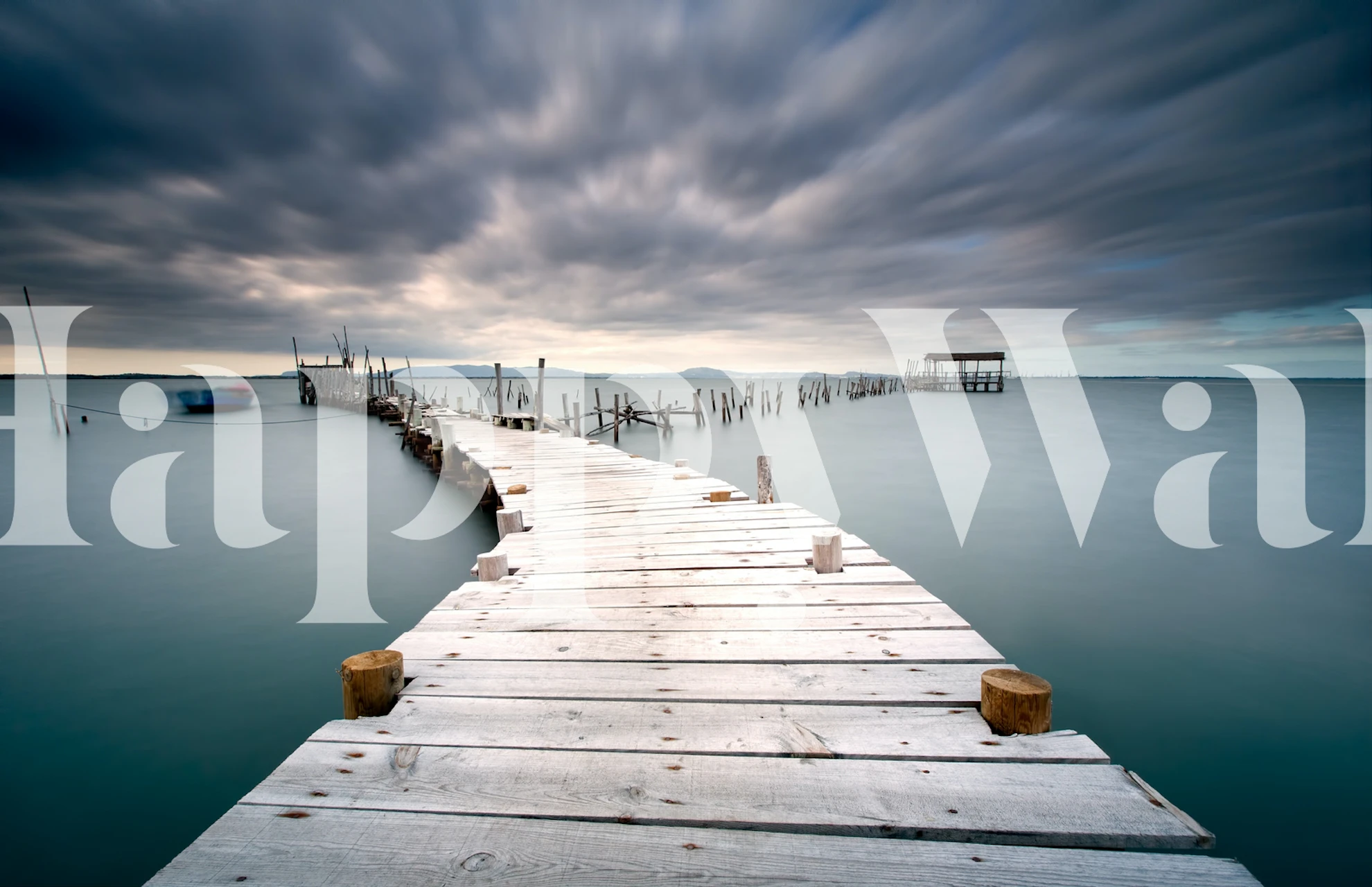Serene wooden pier wall mural leading into calm waters under a twilight sky