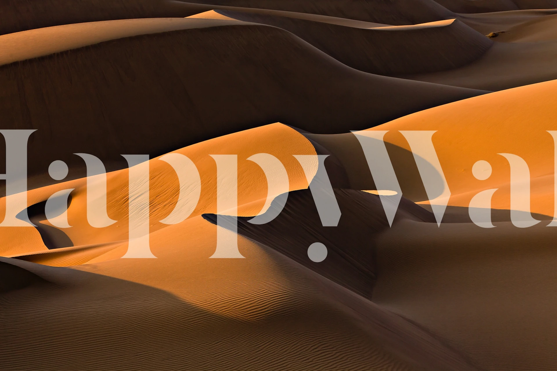 Sand dune patterns in shades of orange and brown wallpaper