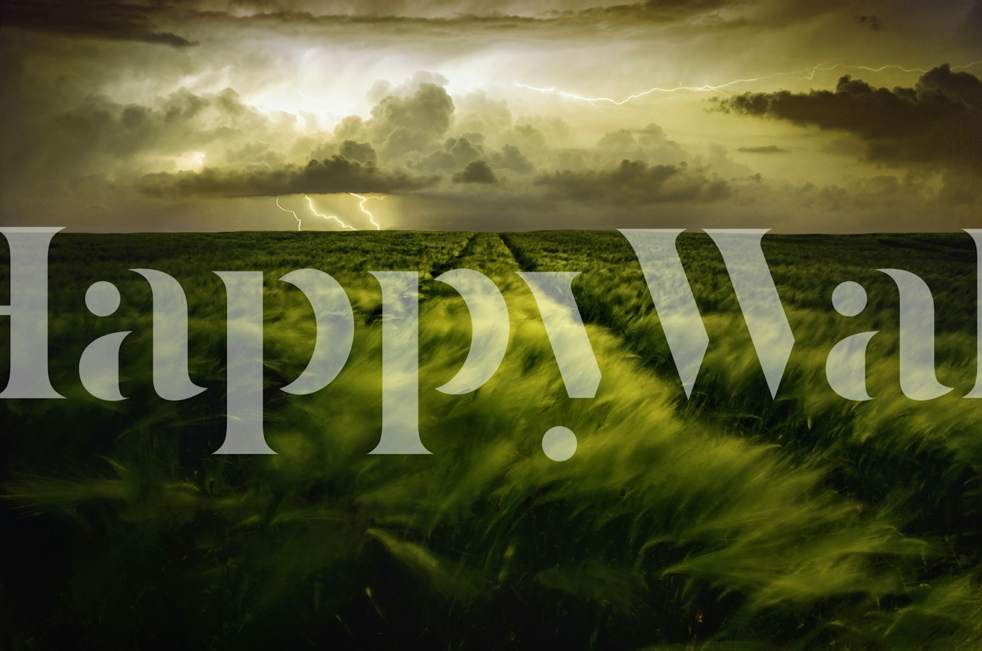 stormy landscape with green fields and dark clouds wallpaper