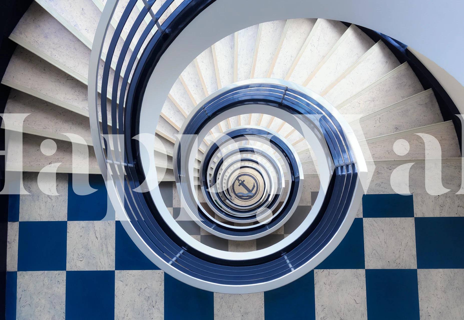 Spiraling staircase wall mural in blue and white tones