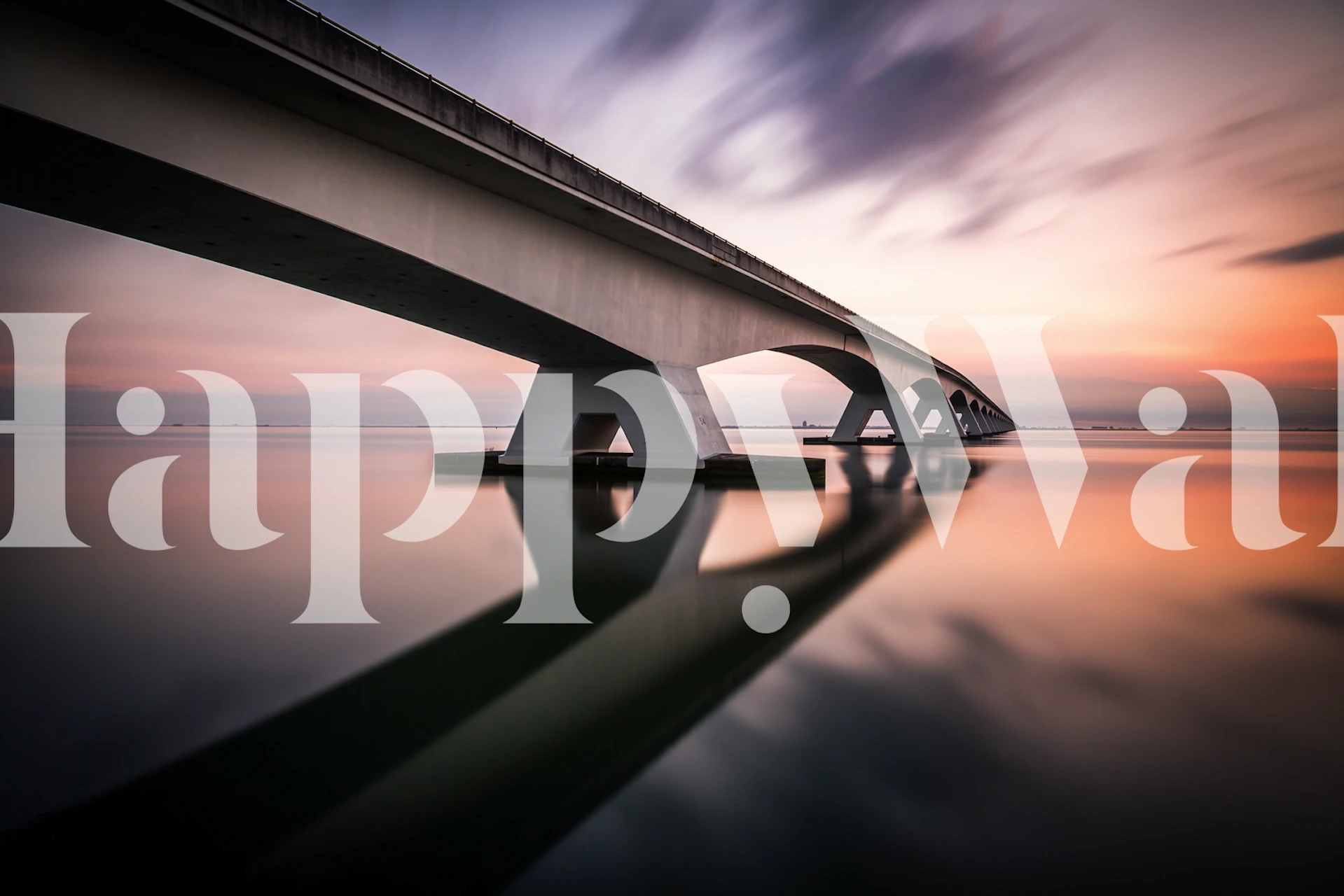 Sunrise seascape with a modern bridge wall mural