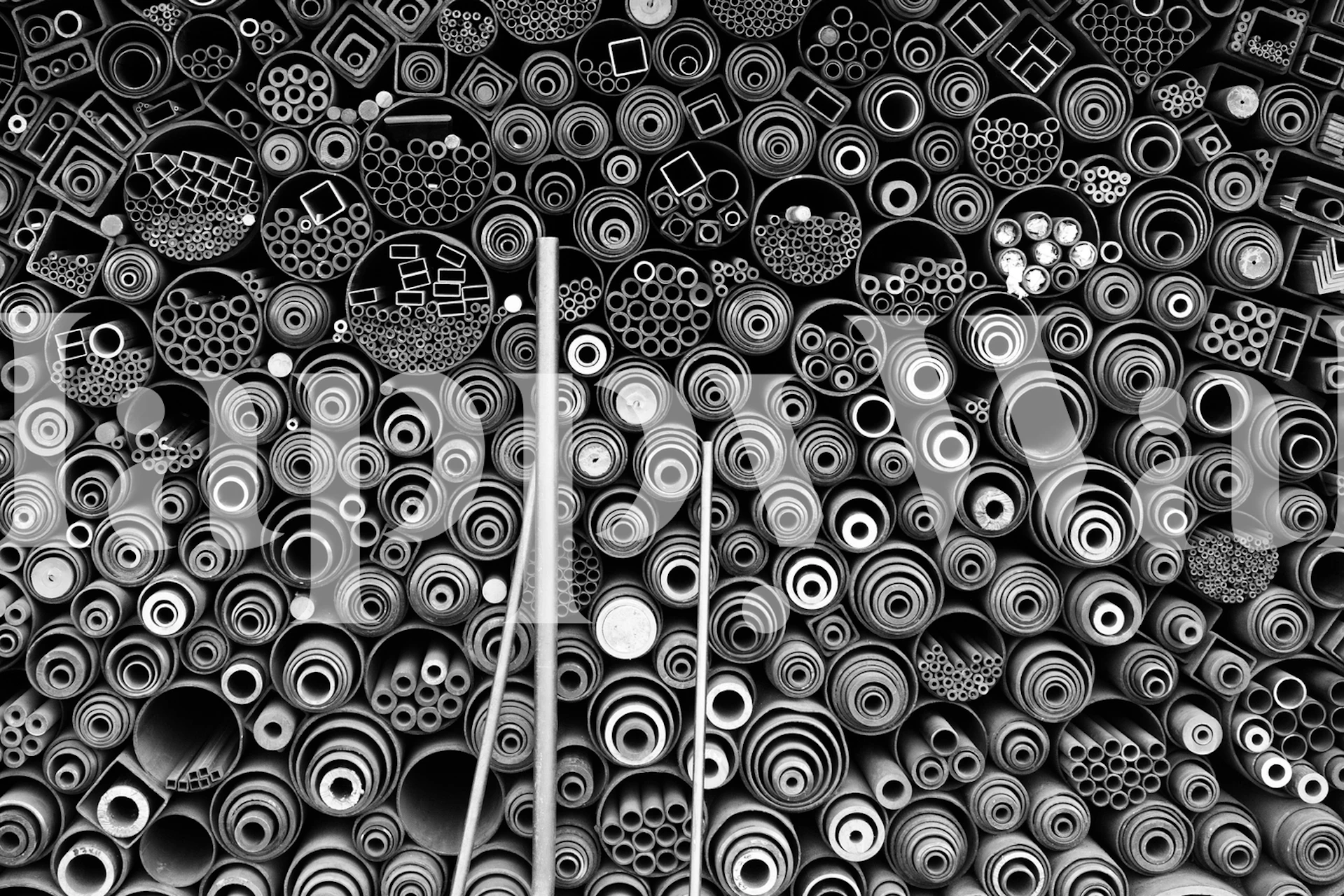 Black and white geometric patterned tube wallpaper