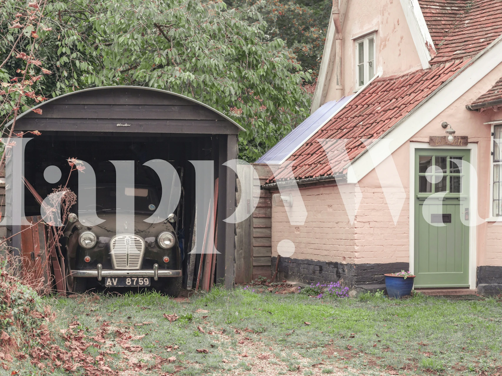 Vintage car in a rustic setting wallpaper