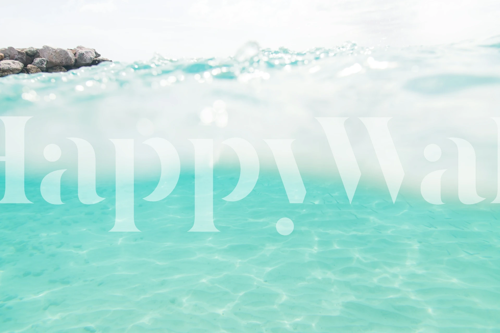 Turquoise water with gentle ripples and light reflection wallpaper