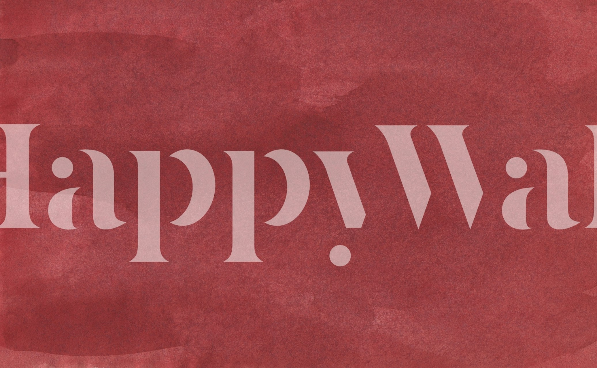 Watercolor texture in soft red tones wallpaper