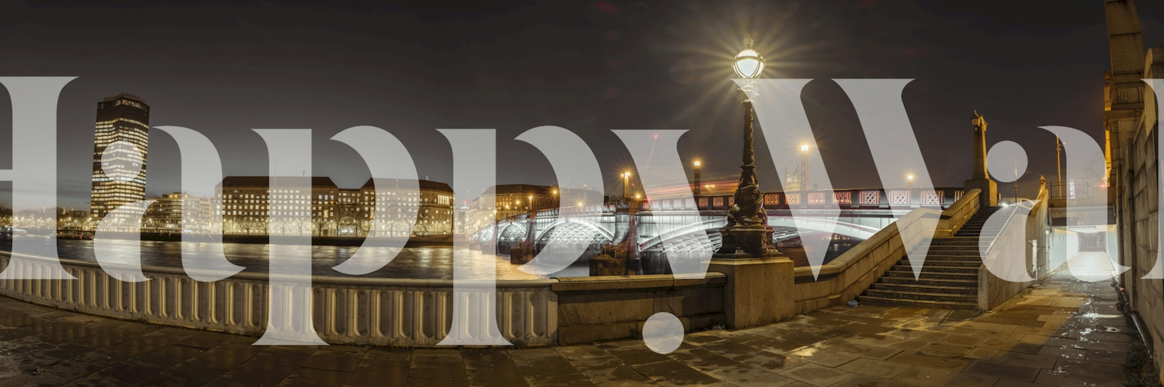 Lambeth Bridge at night with illuminated buildings and reflections, cityscape wallpaper