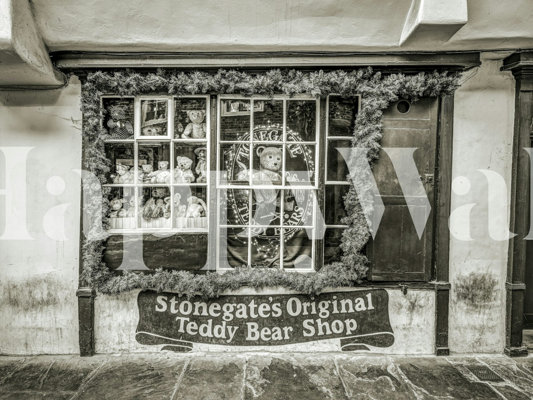 Vintage teddy bear shop window display with black and white colors wallpaper