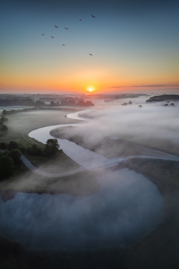 Sunrise over the winding river