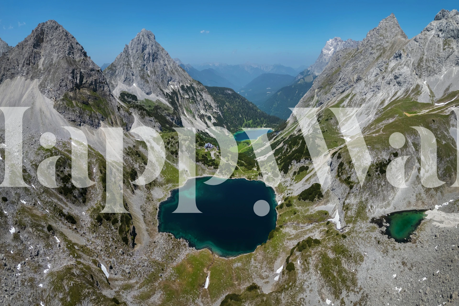 Aerial view of mountain lakes and peaks wallpaper