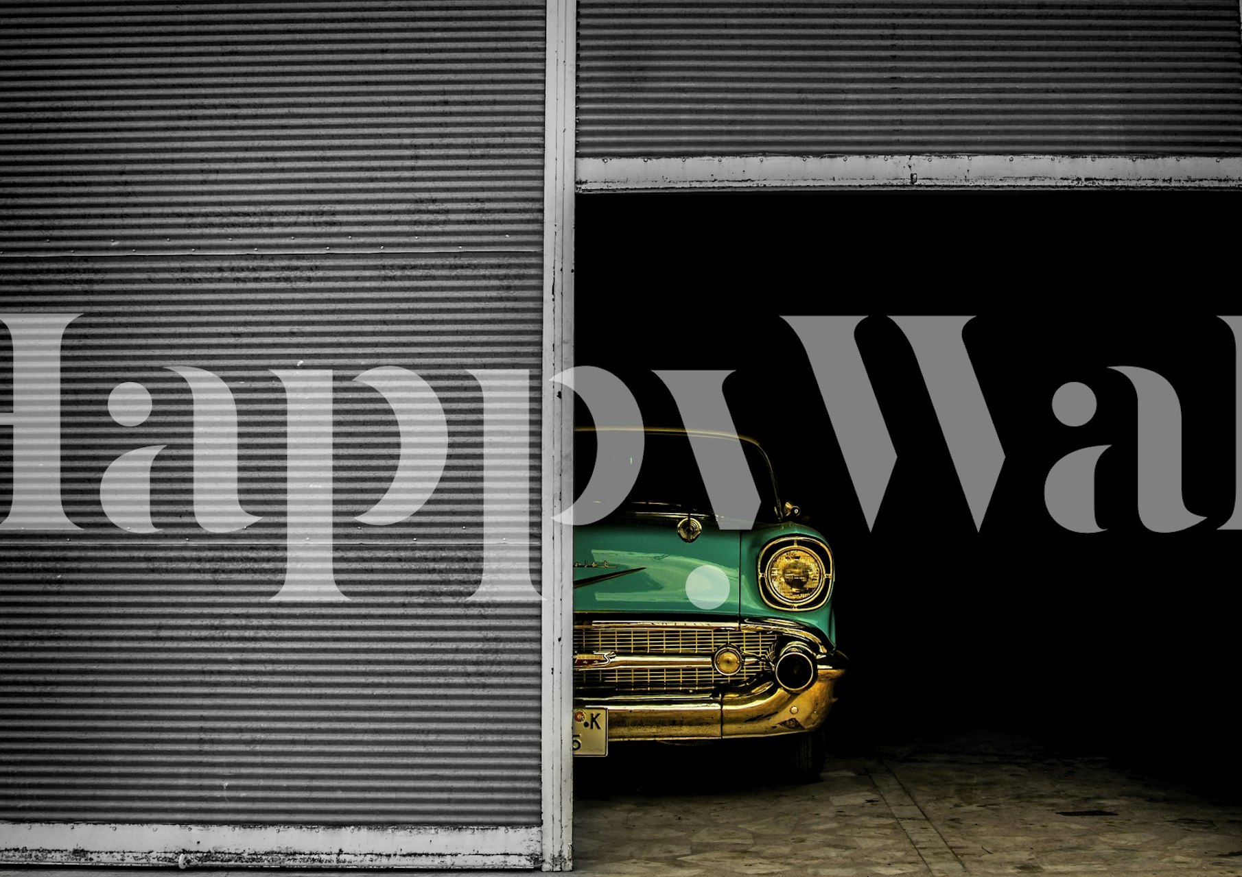 Vintage car with green and gold accents in garage wallpaper