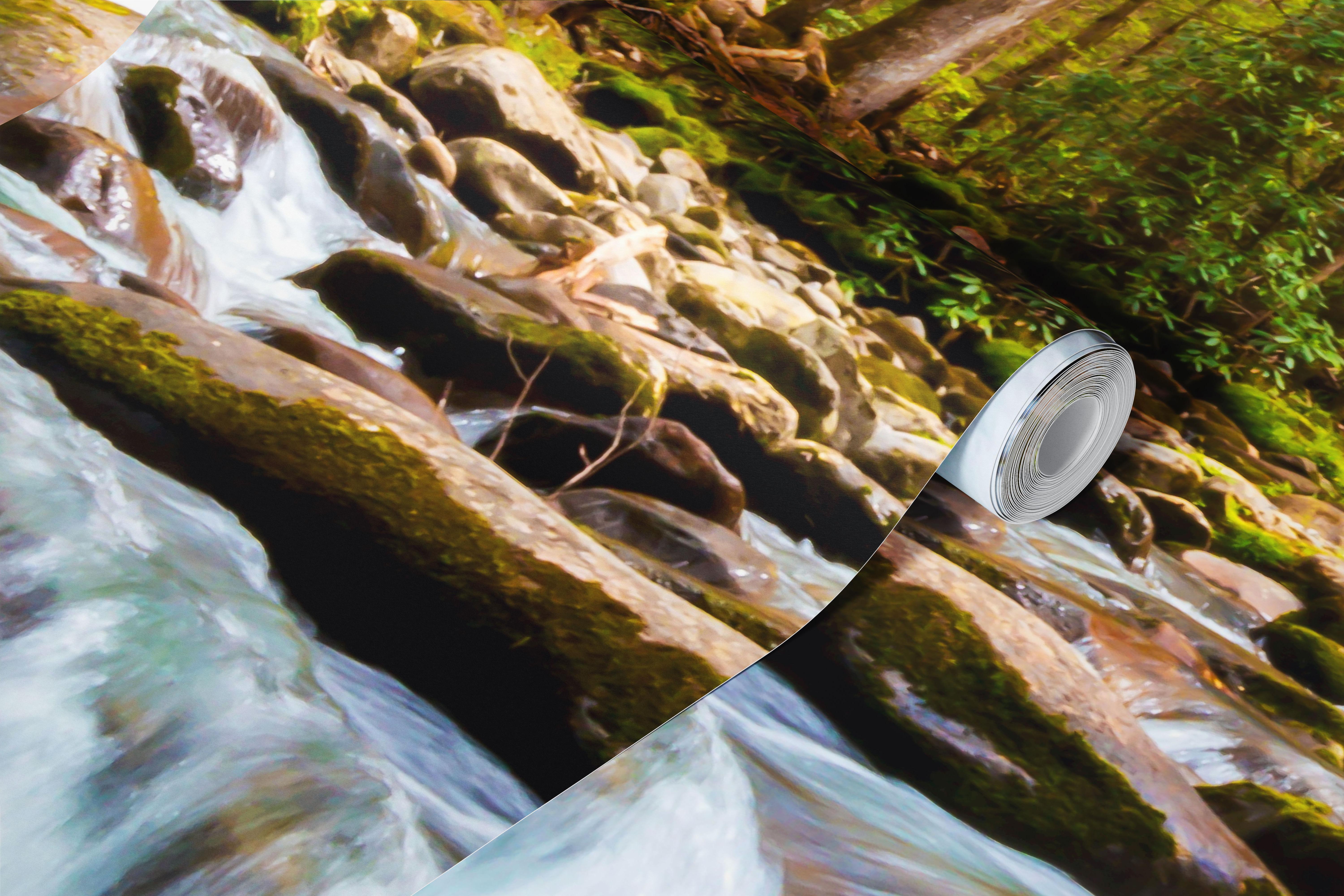 Forest creek with flowing water over rocks and lush green trees wallpaper