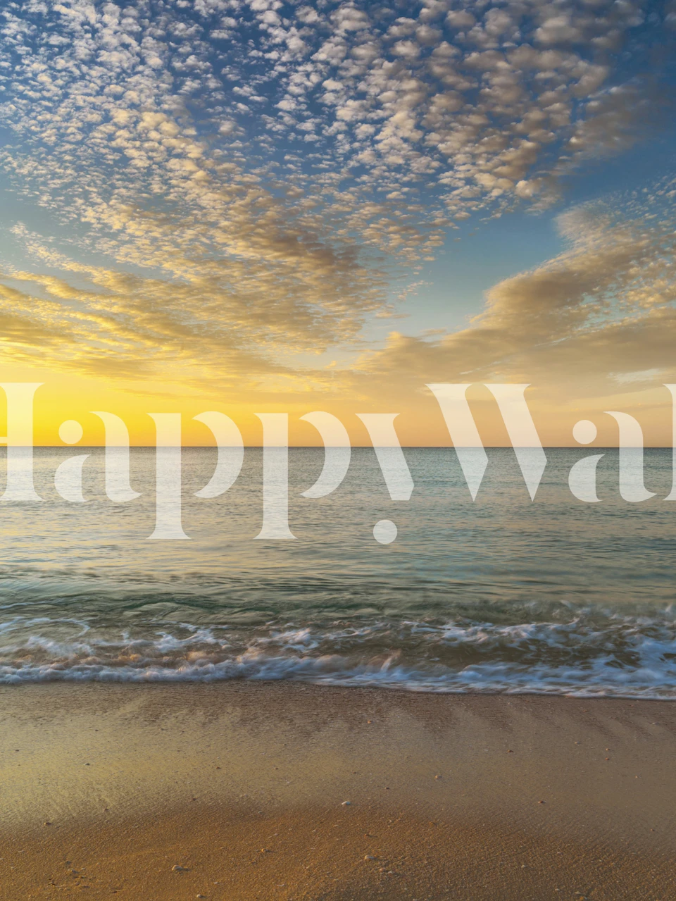 Sunrise over a beach with soft waves and clouds wallpaper