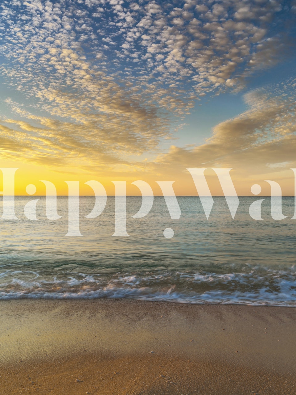 Sunrise over a beach with soft waves and clouds wallpaper