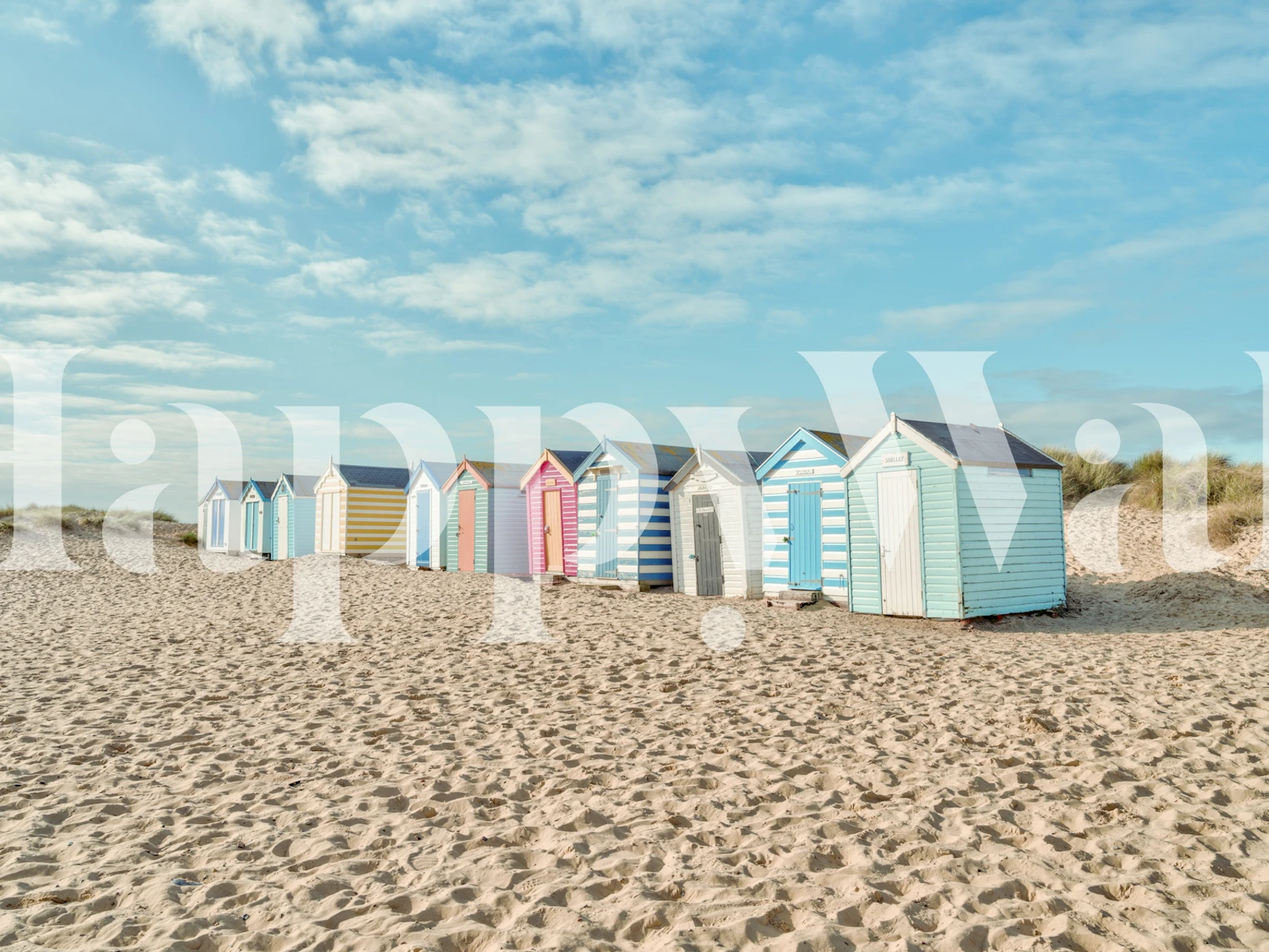 Beach huts on the shore wallpaper design