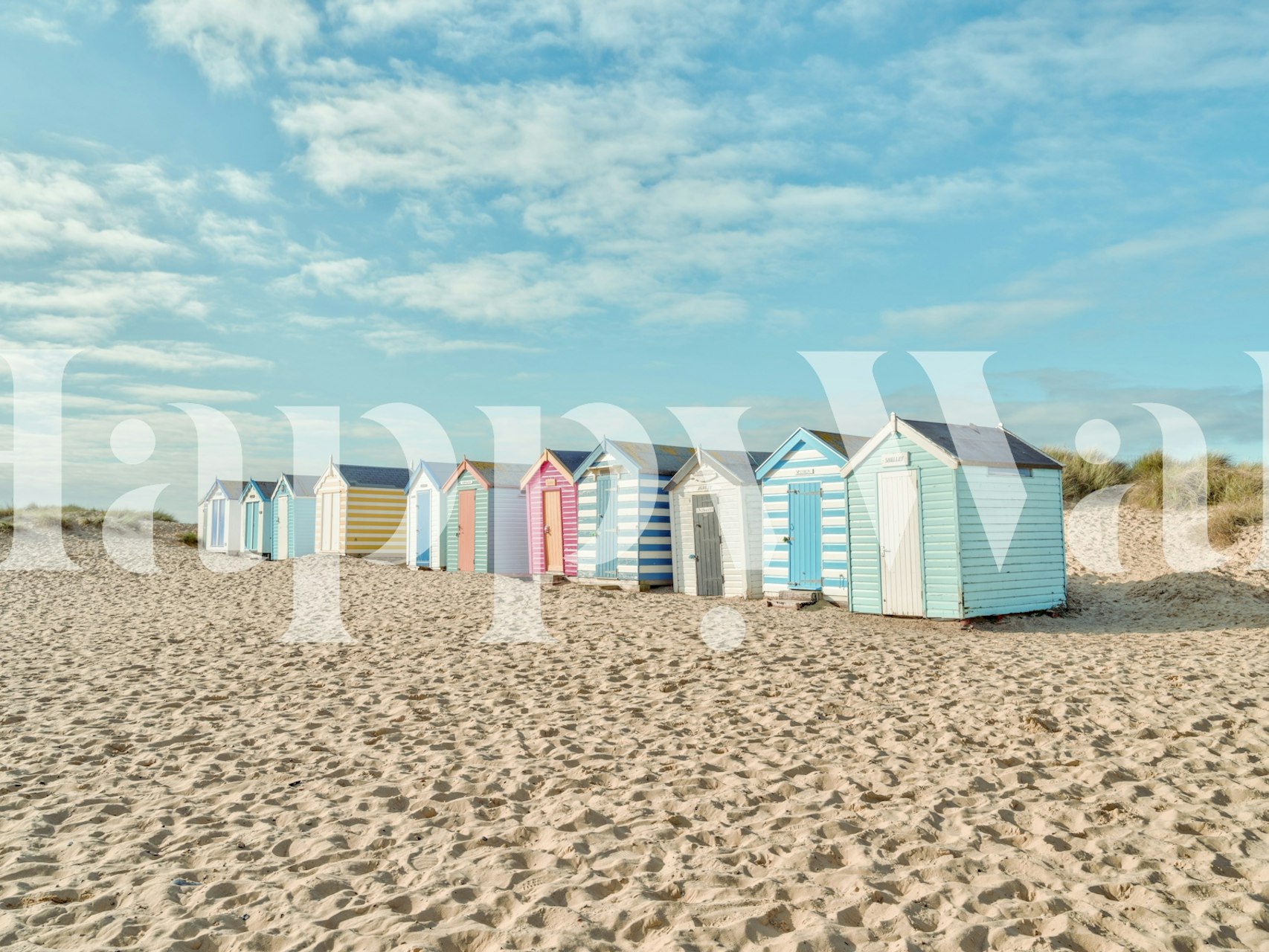 Beach huts on the shore wallpaper design