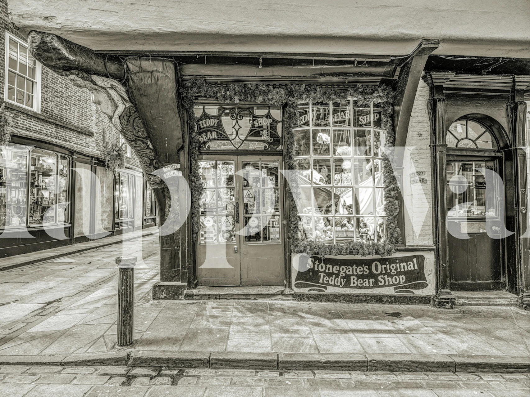 Vintage teddy bear shop exterior in black and white wallpaper
