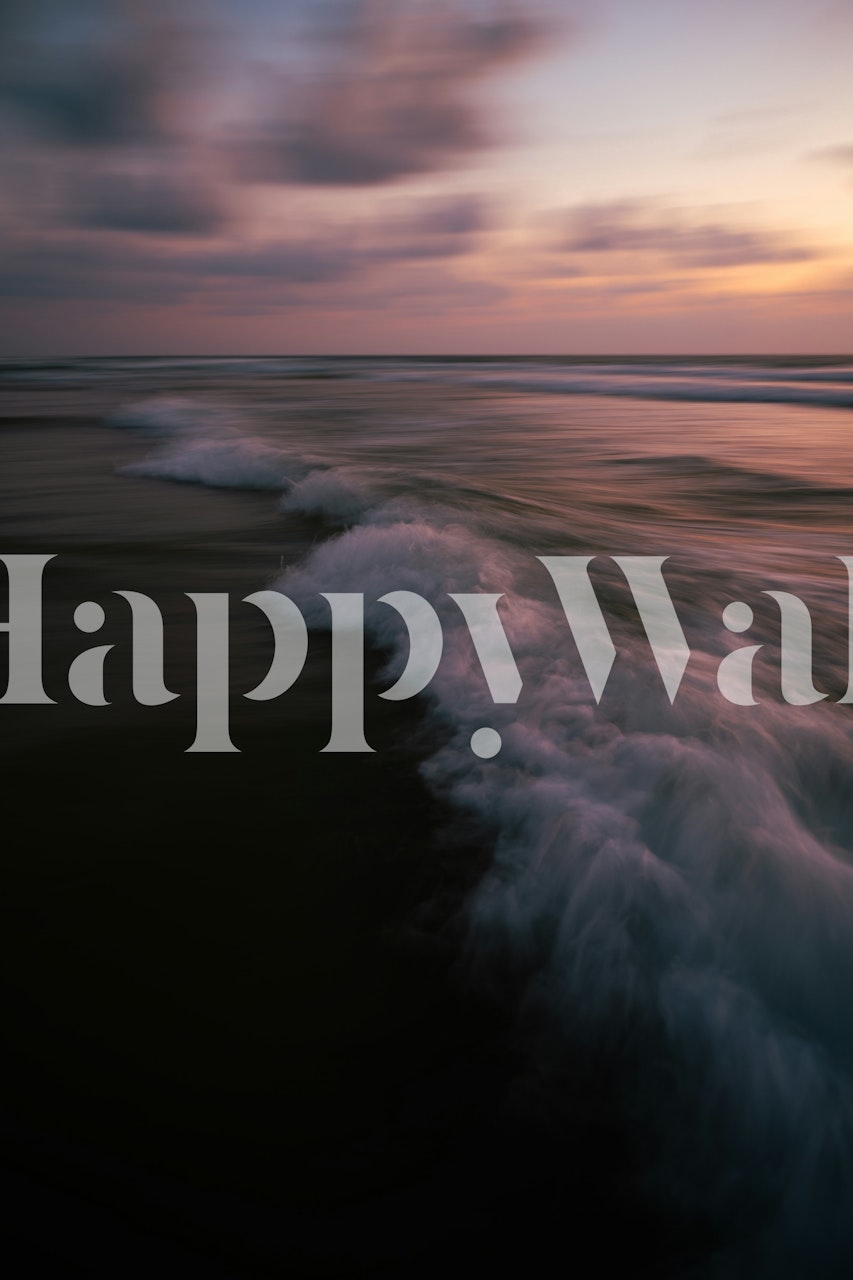 Soft ocean waves under a sunset sky in blue and cream wallpaper