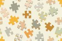 Vintage puzzle pieces in yellow and green wallpaper