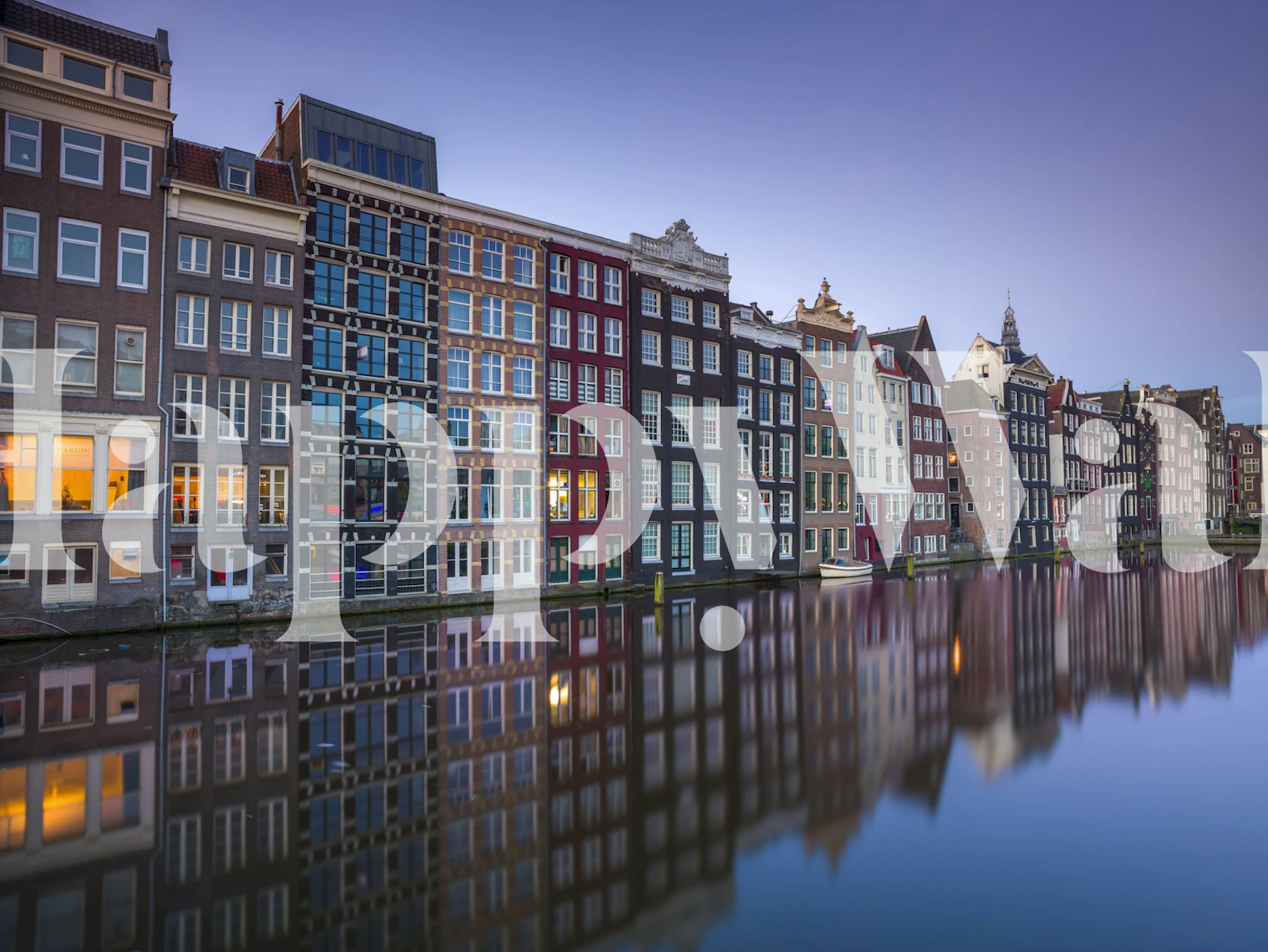 Amsterdam canal houses reflected on water at sunset wallpaper