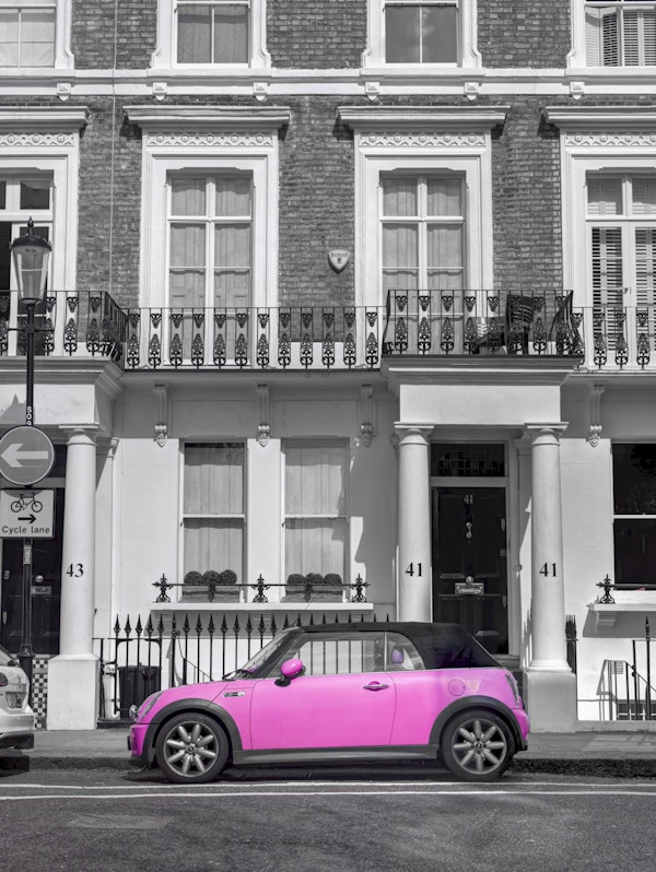 City Architecture with Pink Car
