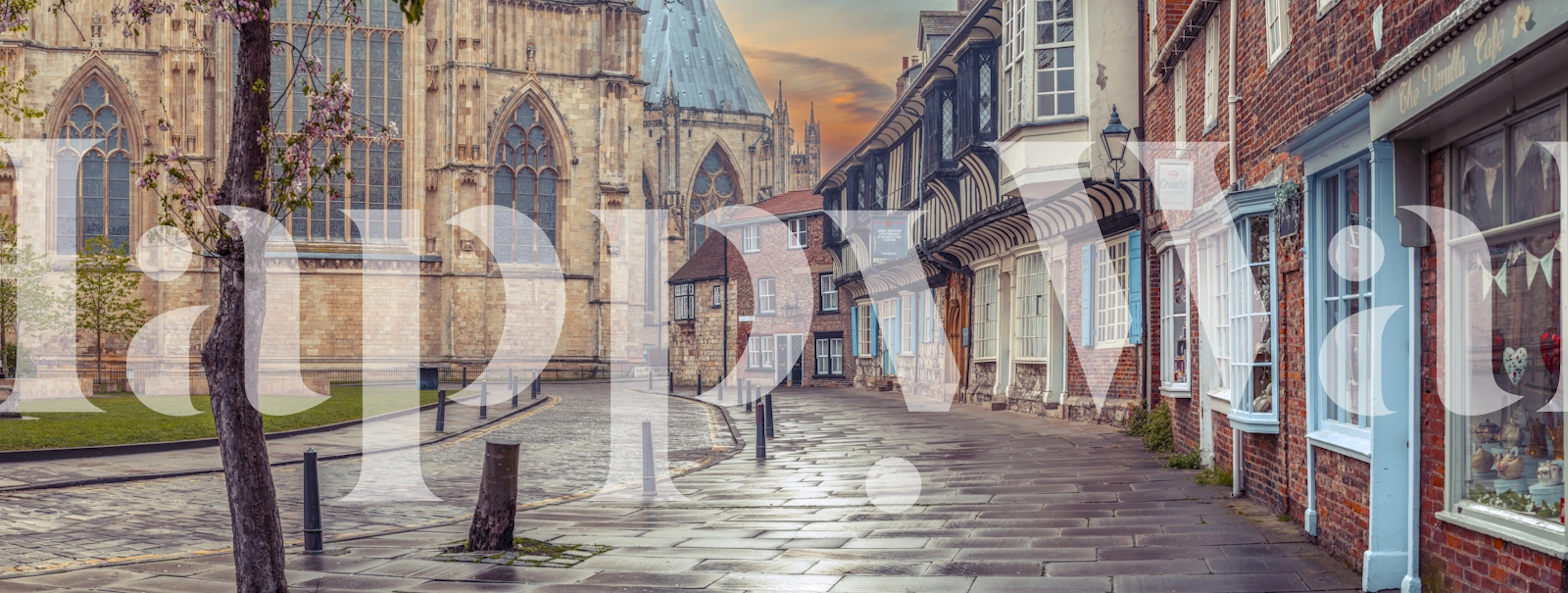 Historic streetscape with buildings and trees, warm colors, city wallpaper