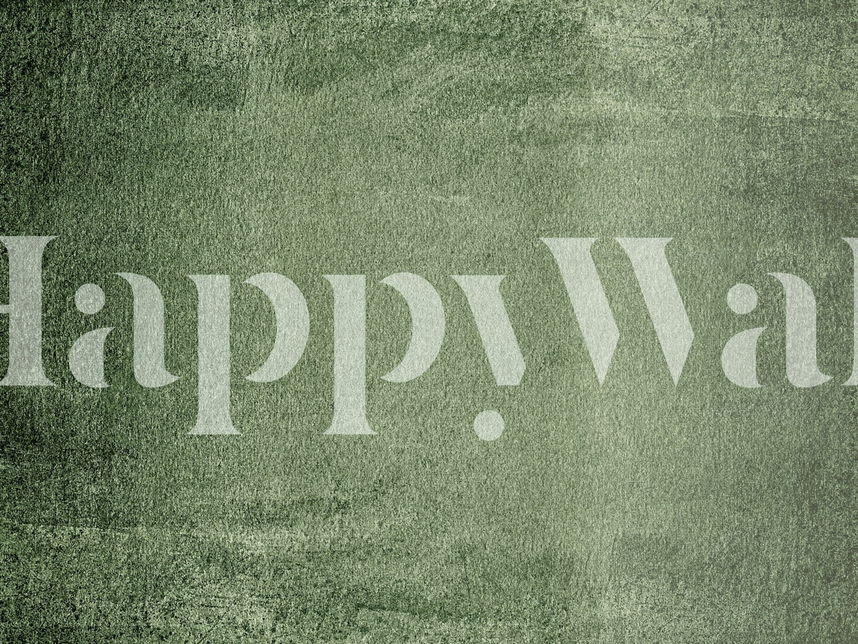 Abstract green textured wallpaper in soft, muted shades