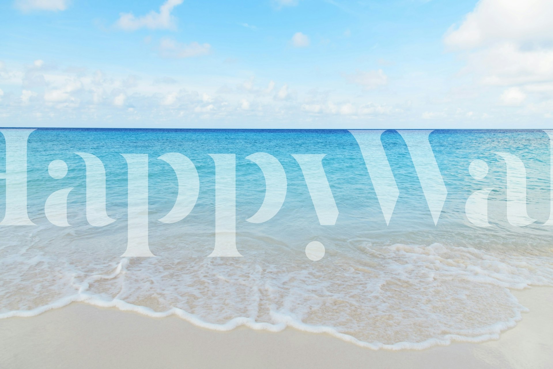 Ocean waves lapping on sandy beach with blue sky wallpaper